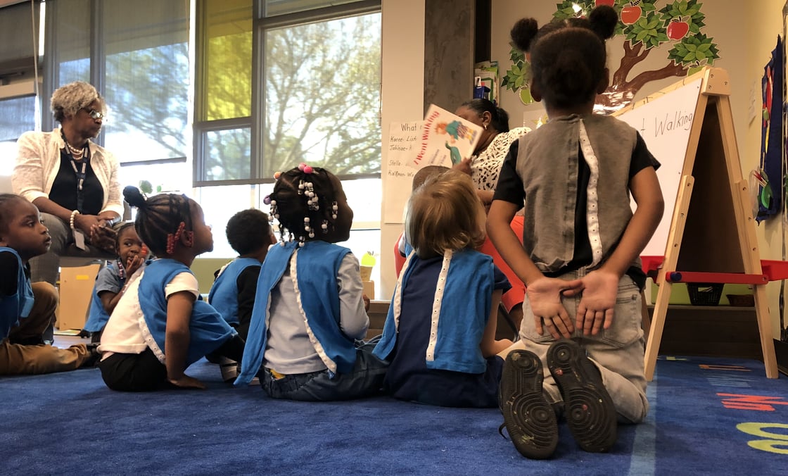 preschool children listening to a story being read